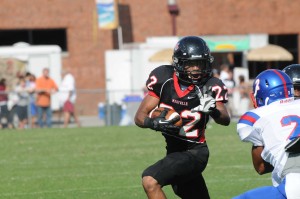 A starter from the first game his freshman season, senior Shawn Prevo finished his career in 2013 as the Rebels all-time leader in carries, rushing yardage and rushing touchdowns. Photo by Brandon Shinn