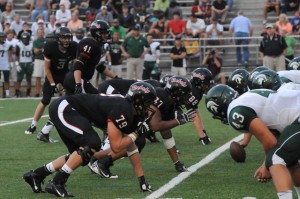 Jackson, Kyle Withrow (77), Matt Young (88) and Ritchie Koons wait for the snap against Webb. Photo by Brandon Shinn
