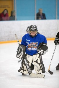 A young goalie works on his game.