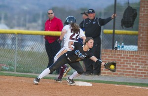 Lady Tornado junior Abbey Lawson beats the throw to first.