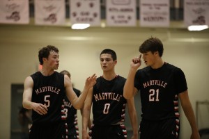 Andrew Petree, Easton Upchurch and Spencer Lowe talk things over heading to the Rebel bench.