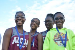 The Alcoa Middle relay of DeeDee Henry, Jada Johnson, Dasha Tate and Ariya Rice stormed to victory in the 4x100 meters.