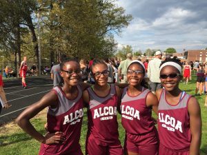 Alcoa's Ruthie Steele, Jada Johnson, DeeDee Henry and Ariya Rice celebrate a relay win at the Blount County championships last month.