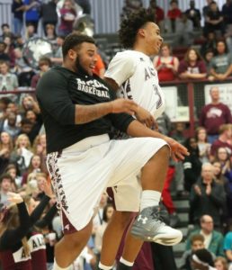 Maliki Salter and Dante Harris get hyped during player introductions.