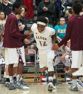 Larry Hodge got the Alcoa student section into the game with a trio of second-quarter treys.